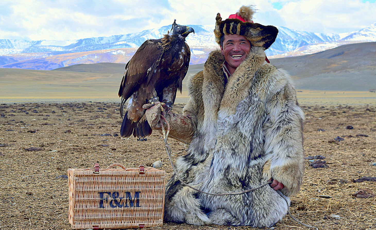 Shohan the eaglehunter with Fortnum & Masons hamper Esgle hunter Adventure | Western Mongolia